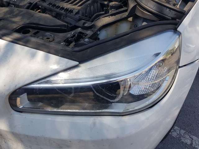 Luz esquerda 63117391401 BMW