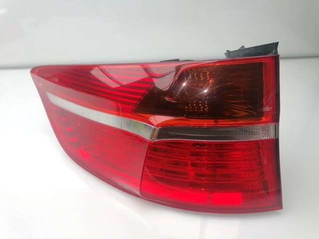 Lanterna traseira esquerda externa 63217295001 BMW