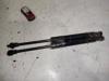 Amortecedor da capota 654704597R RENAULT