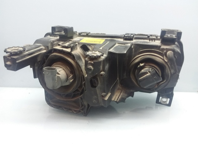 6901969 BMW Левая фара купить в Украина