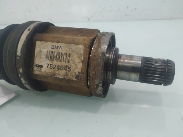 7524045 BMW Полуось (привод) передняя левая купить в Черкассы