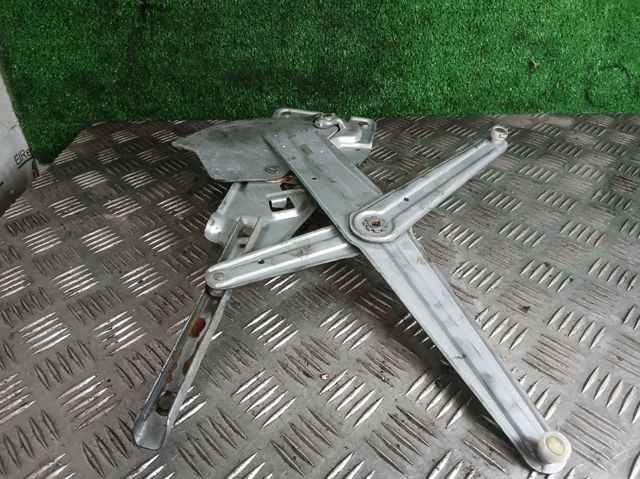 7700830596 RENAULT Стеклоподъемник передней левой двери купить в Николаев