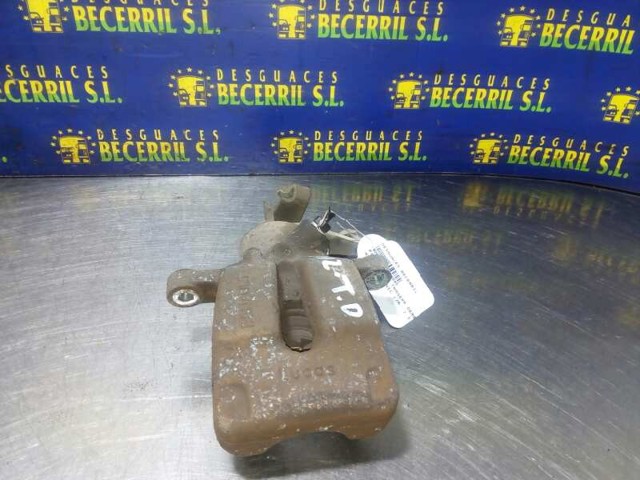 7701206345 RENAULT Суппорт задний правый купить в Ужгород