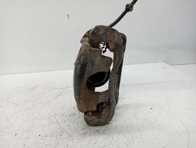 7701207786 RENAULT Суппорт тормозной передний левый купить в Ужгород