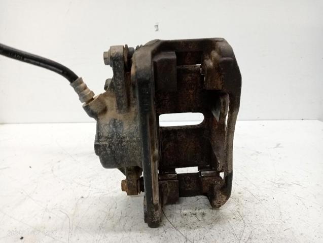 7701207786 RENAULT Суппорт тормозной передний левый купить в Чернигов