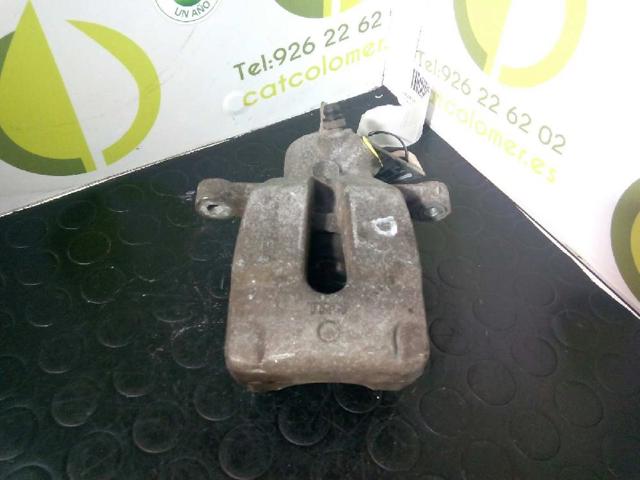 7701208257 RENAULT Суппорт задний правый купить в Украина