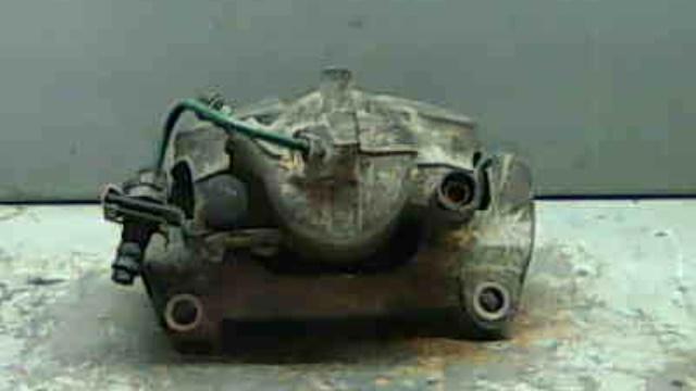 7711135693 RENAULT Суппорт тормозной передний левый купить в Сумы