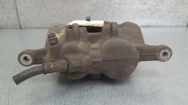 7711135701 RENAULT Суппорт тормозной передний левый купить в Ровно