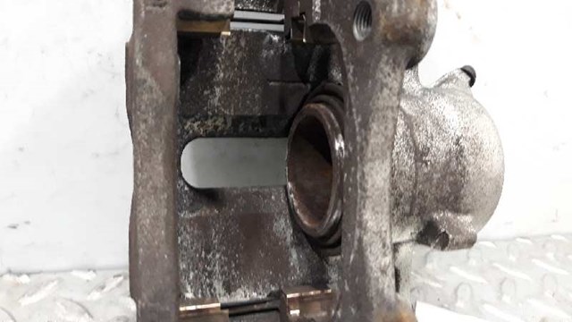 7711368116 RENAULT Суппорт тормозной передний левый купить в Кривой Рог