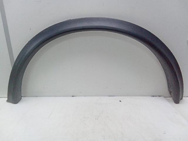 Expansor esquerdo (placa sobreposta) de arco do pára-lama traseiro 788611KA6A Nissan