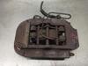 Suporte do freio traseiro esquerdo 7L6615423L VAG