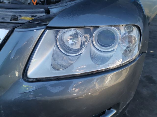 VAG 7L6941017BF Левая фара в наличии Каменское