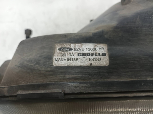 92VB13006AB FORD Стекло фары левой купить в Винница