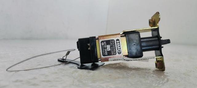 957203K000 Мотор-привод открытия лючка бака купить Ирпень