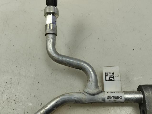 FORD LX6H19N601CD Шланг кондиционера, от компрессора к радиатору в наличии Чернигов