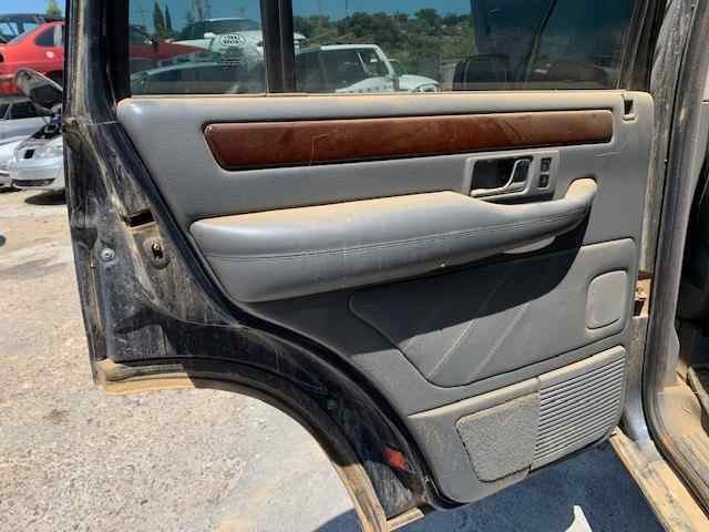 Revestimento (cobrimento) interno da porta traseira esquerda VBA500130 Land Rover