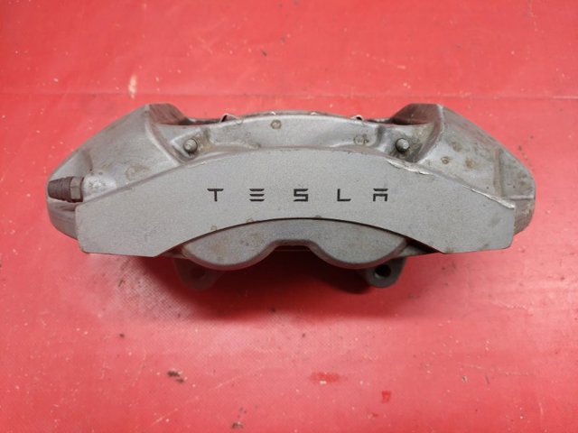 Суппорт тормозной, передний, левый 104462100D TESLA