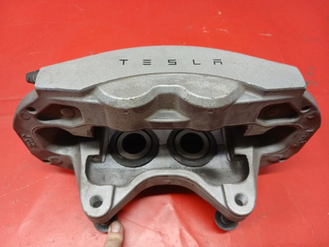Суппорт тормозной, передний, левый 104462100E TESLA