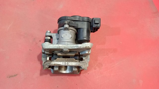 Суппорт тормозной, передний, левый 410116RA0A NISSAN