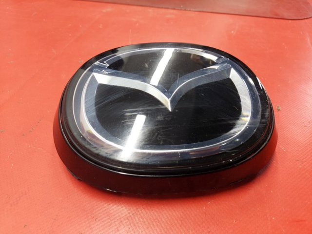 MAZDA BCKB51730A Эмблема решетки радиатора в наличии Сумы