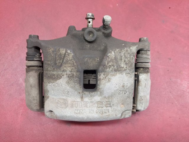 Суппорт тормозной передний левый BCYA3399ZB MAZDA