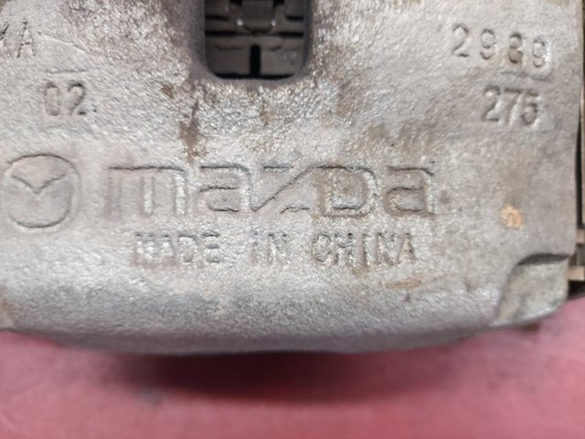 BCYA3399ZB MAZDA Суппорт тормозной передний левый купить в Киев