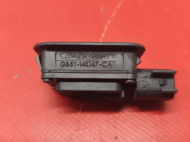 GB5T14K147CA Кнопка привода замка багажника купить Николаев