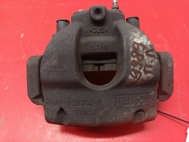Суппорт тормозной, передний, левый JX6Z2B121K FORD