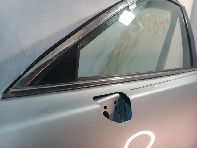 Молдинг опускного стекла нижний, двери передней, левой TK4850650 MAZDA