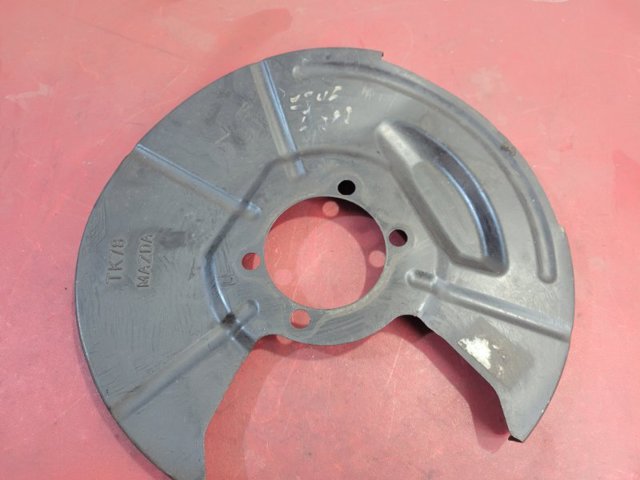 Защита тормозного диска заднего, левая TK7826271 MAZDA