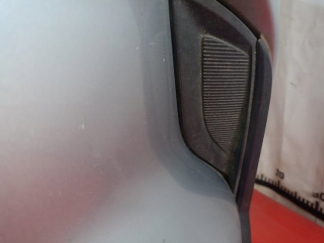  Решетка переднего бампера левая TK7850C21B MAZDA