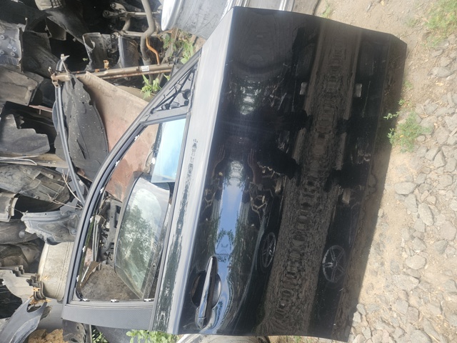 Пассажирская передняя дверь 41517191012 BMW