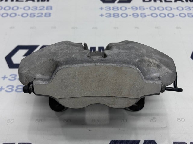 Суппорт тормозной, передний, левый 34116883483 BMW
