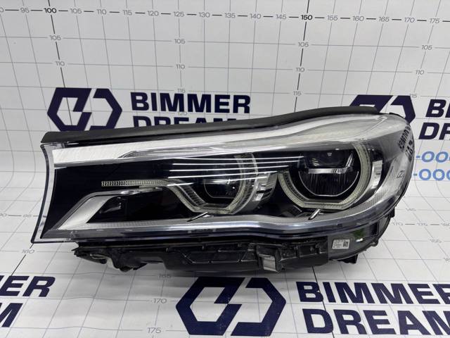 Блок фара левая 63117408705 BMW