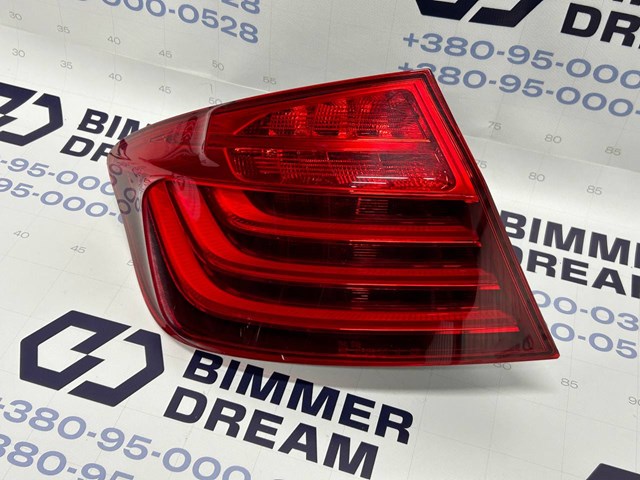 Задний левый внешний фонарь 63217312707 BMW