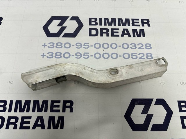 7583120 BMW Кронштейн радиатора нижний купить в Хмельницкий