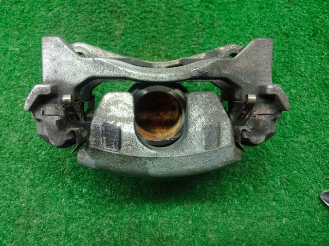 410113TA0C NISSAN Суппорт тормозной передний левый купить в Одесса