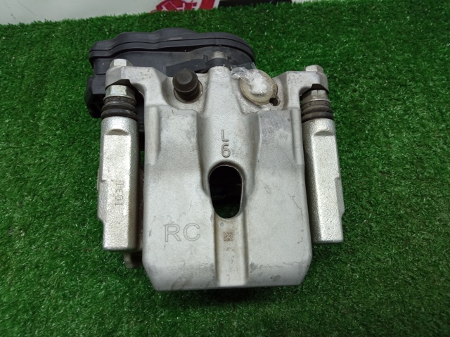 Суппорт тормозной левый задний D40106RA0C NISSAN