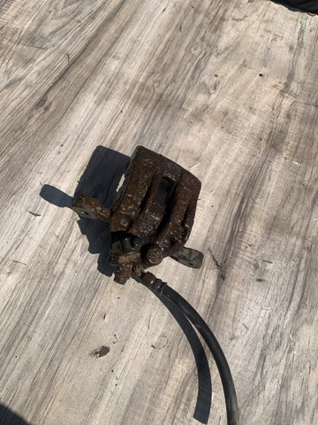 Задний правый суппорт 582301H300 HYUNDAI