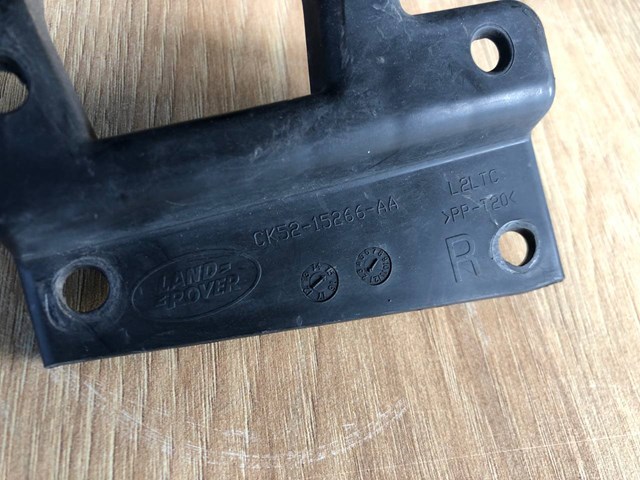LR050519 LAND ROVER Кронштейн крепления противотуманной фары правой купить в Сумы