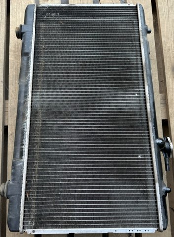 Радиатор охлаждения двигателя. оригинал suzuki liana 1.6b. доставка любой почтой. гарантия на установку 14 дней. 1770054G00