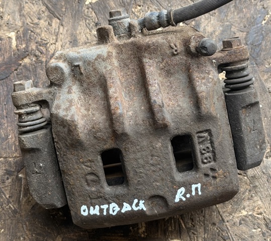 Суппорт тормозной передний правый 26292AE021 SUBARU