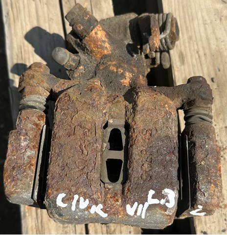 Тормозной суппорт задний левый Honda Civic 7