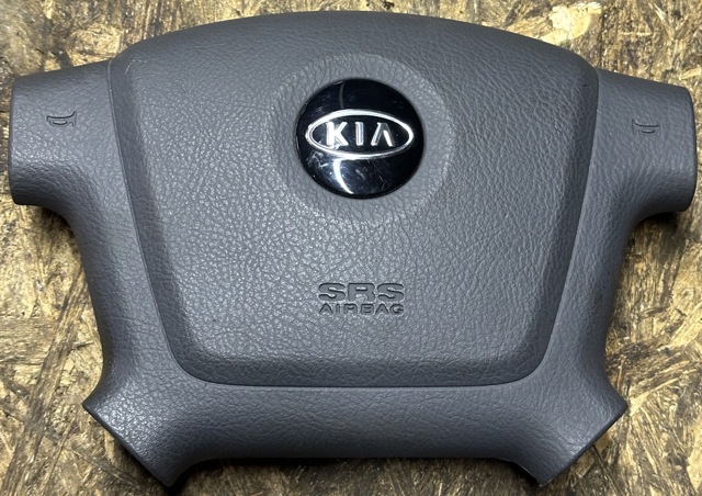 Подушка безопасности водителя 569002F020GW HYUNDAI