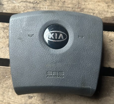 Подушка безопасности водителя 569103E010CQ HYUNDAI