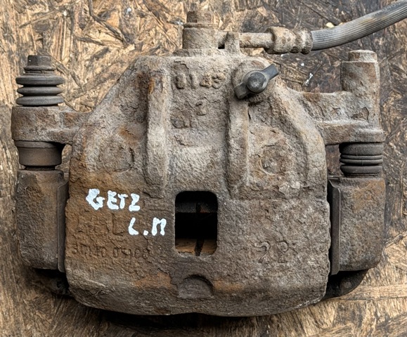 Супорт тормзной 581101C100 HYUNDAI