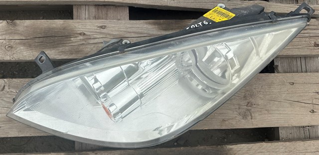 Фара левая передняя 8301B869 MITSUBISHI