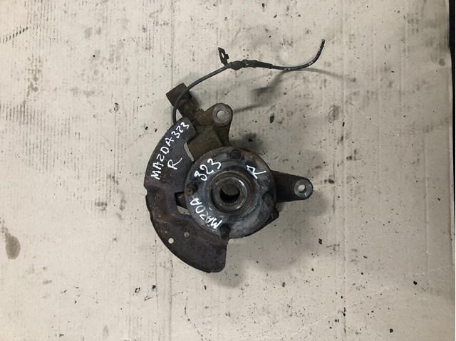 Цапфа - поворотный кулак передний, правый B25D33021B MAZDA