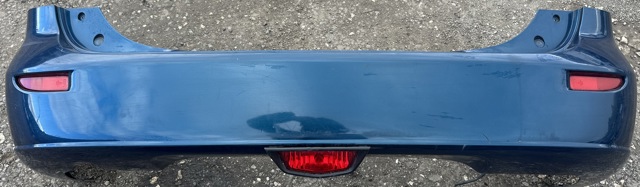 Бампер задний CC2950221DAA MAZDA