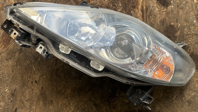 Вставка фары левой CC30510L0D MAZDA